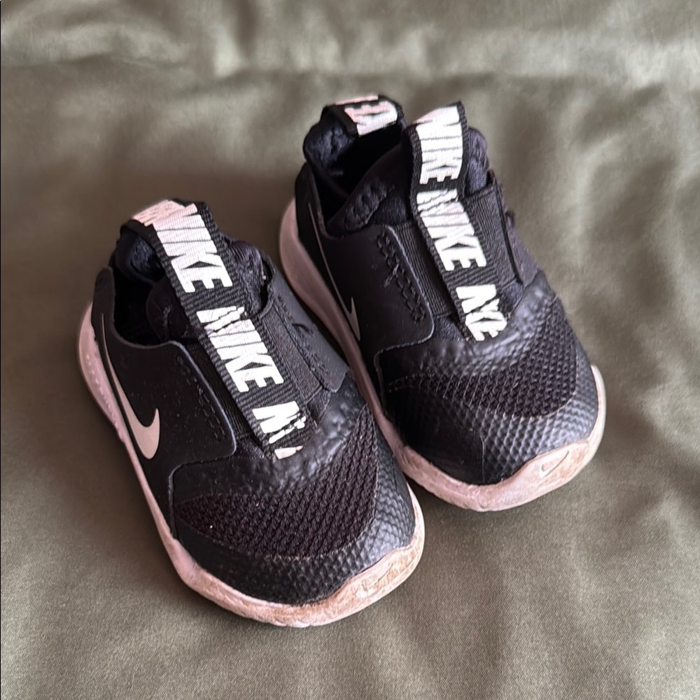 Nike Black and White Sneakers with Streamlined Design